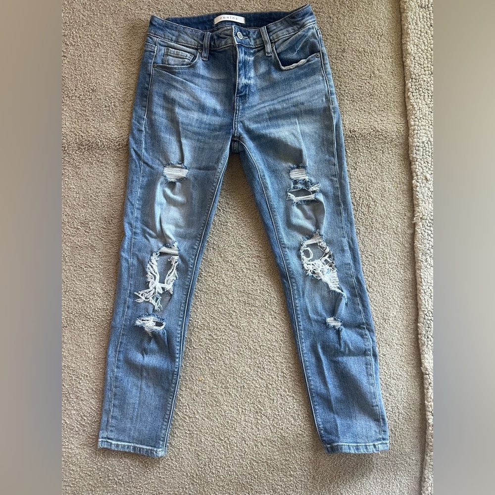Mid rise medium wash skinny jeans